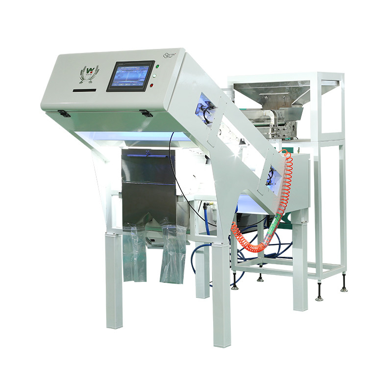 100 à 900 kg/h Sortir la couleur de la machine pour la noix de macadamia Wanlut Noix de noisette