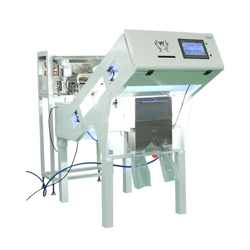 100 à 900 kg/h Sortir la couleur de la machine pour la noix de macadamia Wanlut Noix de noisette