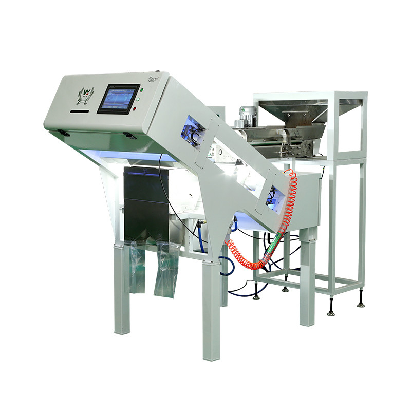 100 à 900 kg/h Sortir la couleur de la machine pour la noix de macadamia Wanlut Noix de noisette